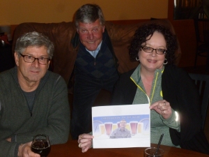 Roy Lamber, Kevin Brannon and Gretchen Reuter with Thebeerchaser logo